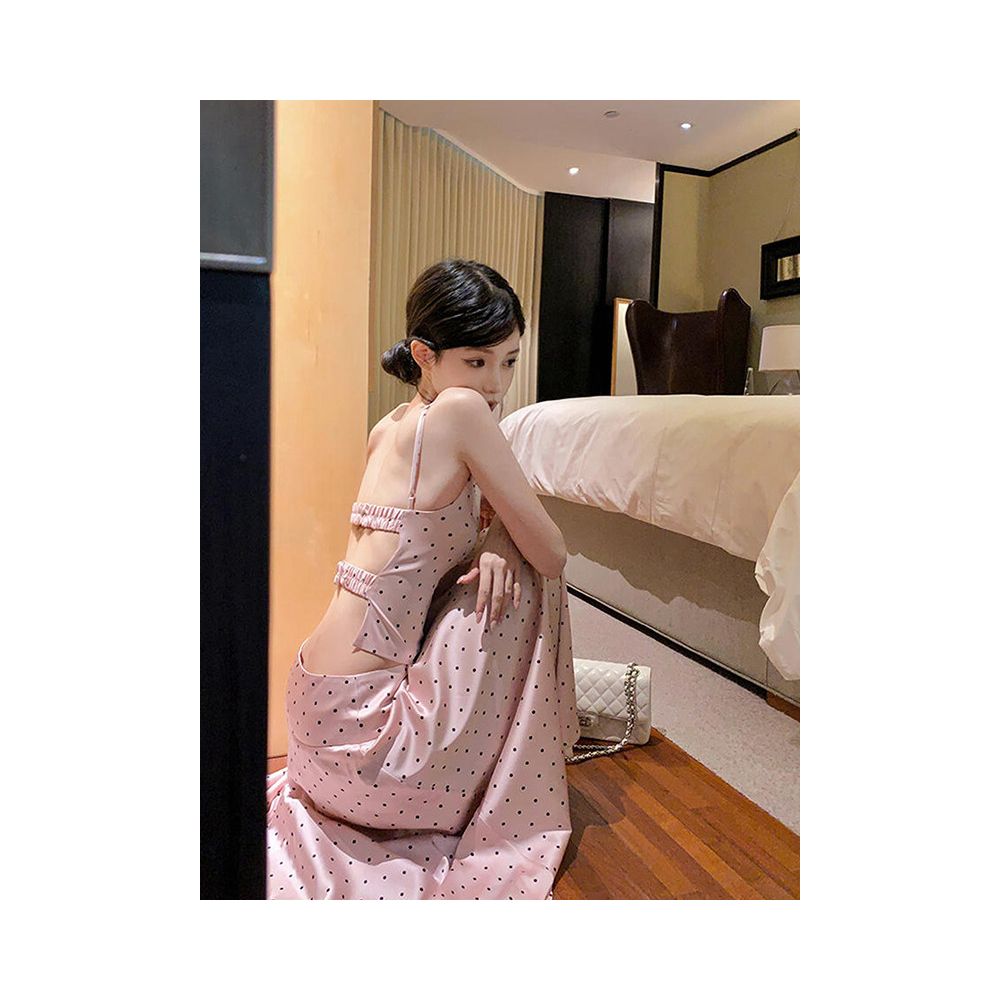 Sexy and alluring two piece women s suit featuring a pink satin polka dot backless top and skirt exuding a relaxed and elegant vibe image 4