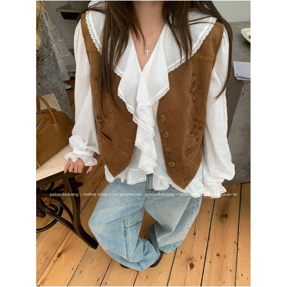 Big braced dog Rococo Tea has styled this suede vest with great flair image 2