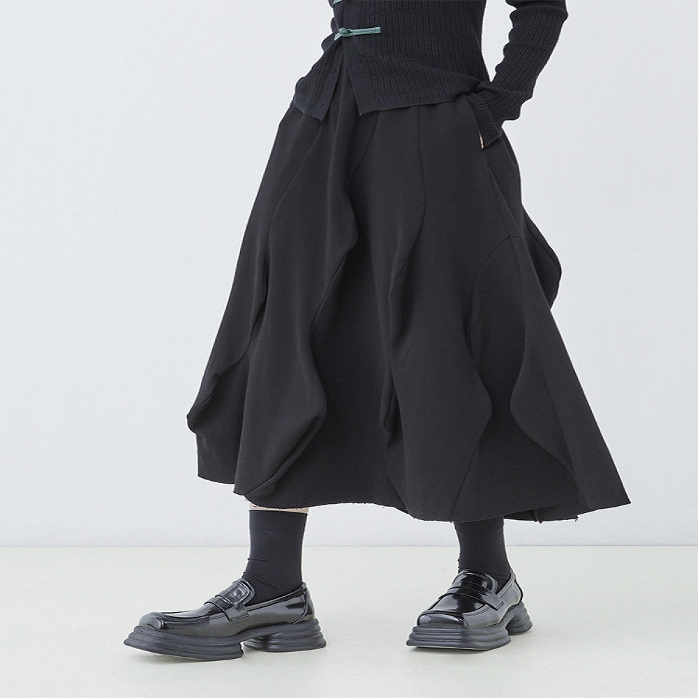 Original designer s black irregular half skirt for women in autumn and winter deconstructing waves and stitching medium length A line skirt image 11