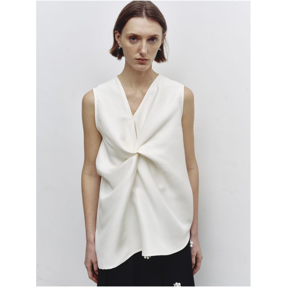 Serrer Off white asymmetrical V neck knot sleeveless top image 1