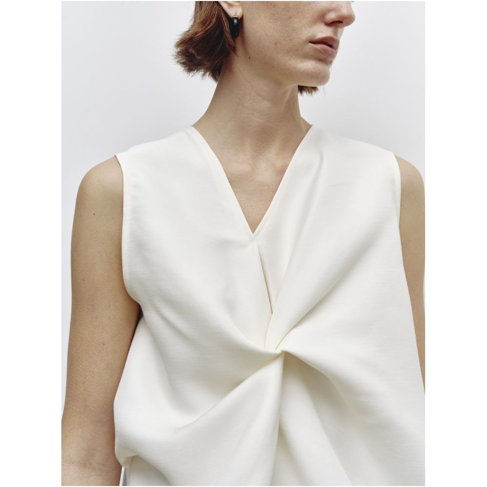 Serrer Off white asymmetrical V neck knot sleeveless top image 5