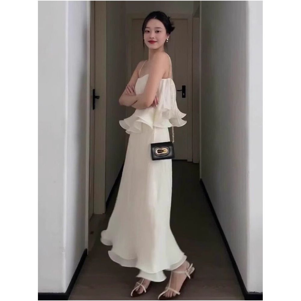X Rose Two Piece Set A sophisticated pleated design with ruffled trim featuring a high waisted midi skirt and a camisole top image 2