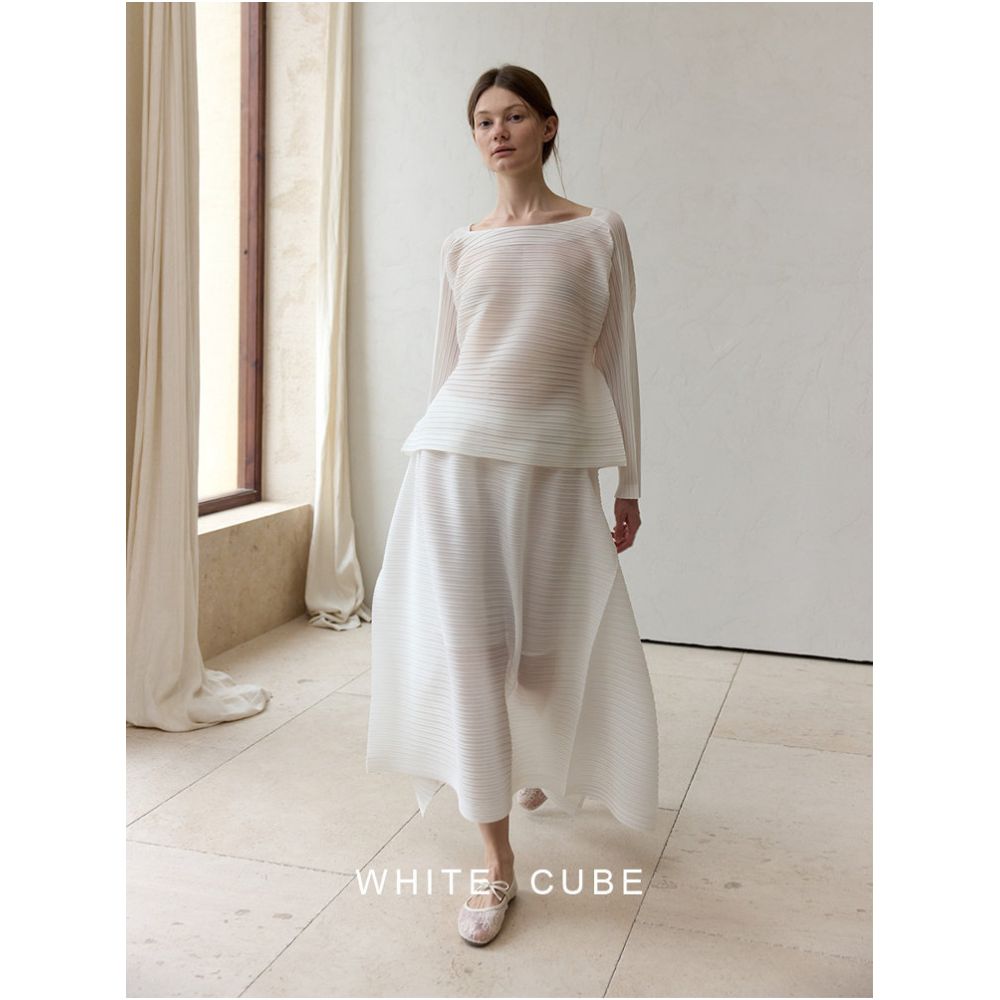 Whitecube a women s shirt T shirt cardigan with a pleated round neck and button back design featuring a Miyake inspired style image 1