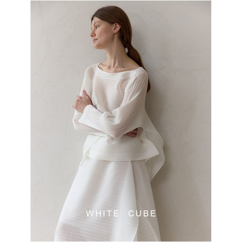 Whitecube a women s shirt T shirt cardigan with a pleated round neck and button back design featuring a Miyake inspired style image 2