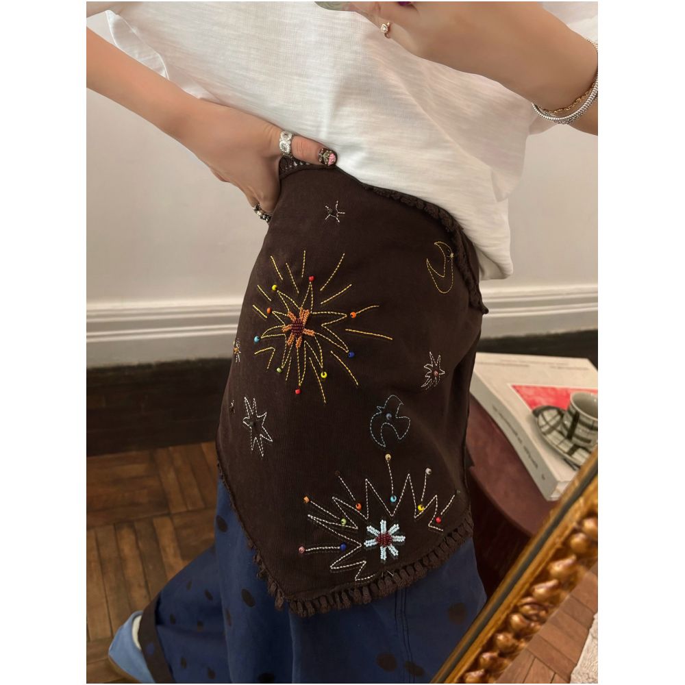 Jeans with a silk scarf belt high end embroidered details layered over a shawl triangular scarf and a waist belt image 0