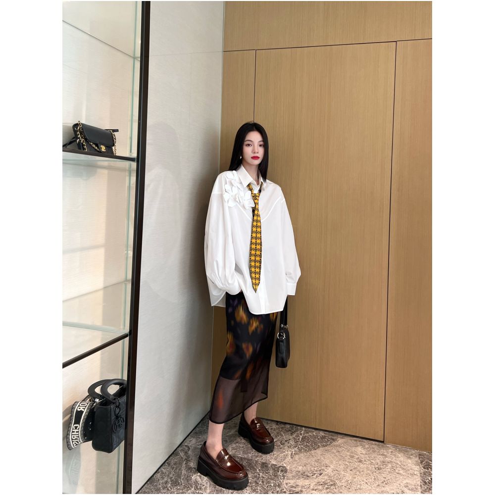 Nancy Cavally s exquisite and ultra soft cotton shirt with artistic and dynamic three dimensional floral silhouette at the counter image 0