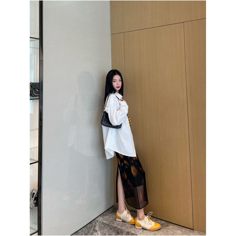 Nancy Cavally s exquisite and ultra soft cotton shirt with artistic and dynamic three dimensional floral silhouette at the counter image 1