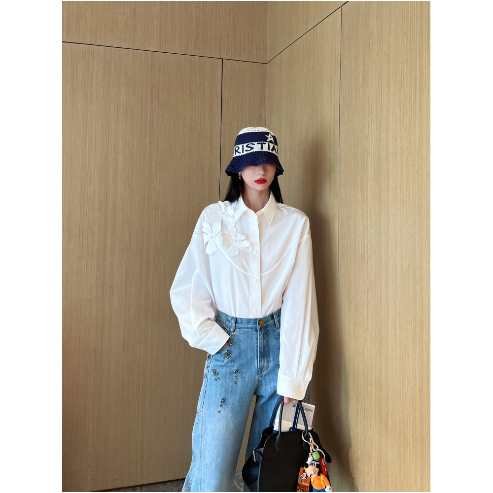 Nancy Cavally s exquisite and ultra soft cotton shirt with artistic and dynamic three dimensional floral silhouette at the counter image 2