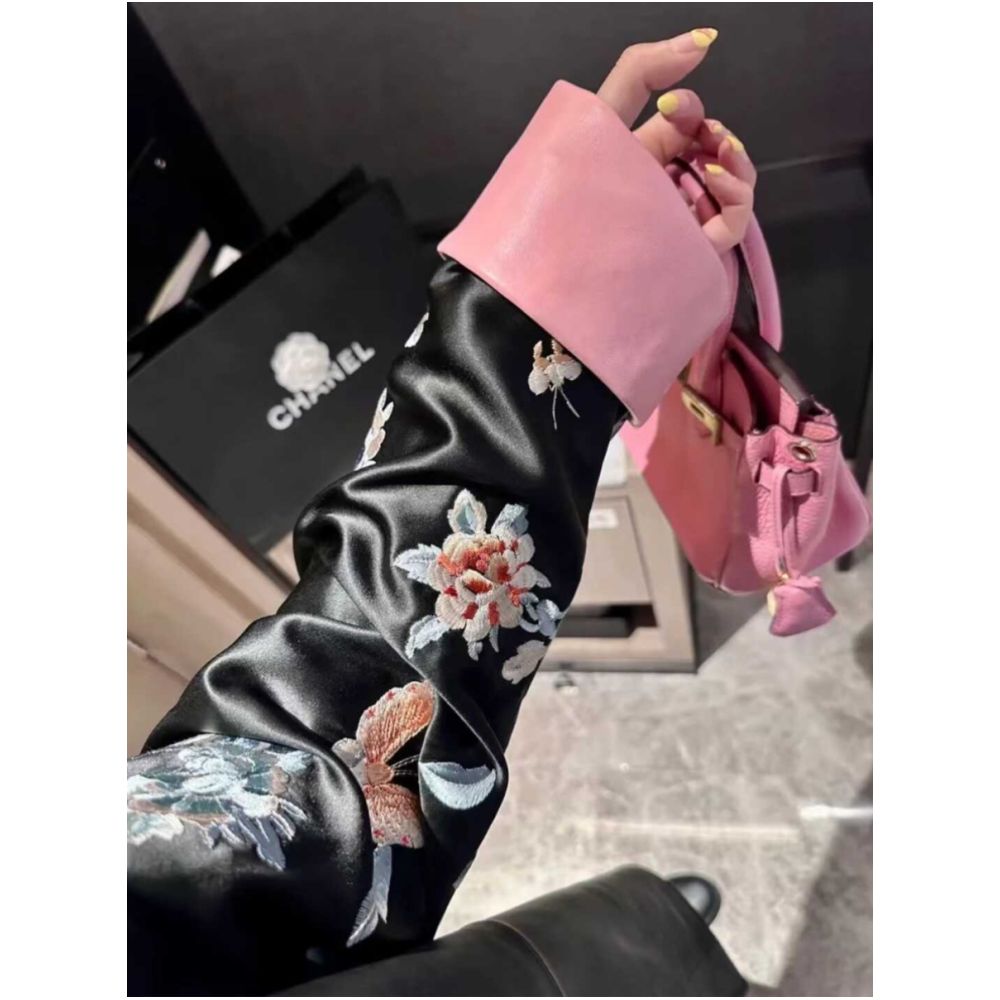 2025 early autumn outfit new stand up collar black same style Chinese knot national style Western style loose leather jacket women s mid length jacket image 3