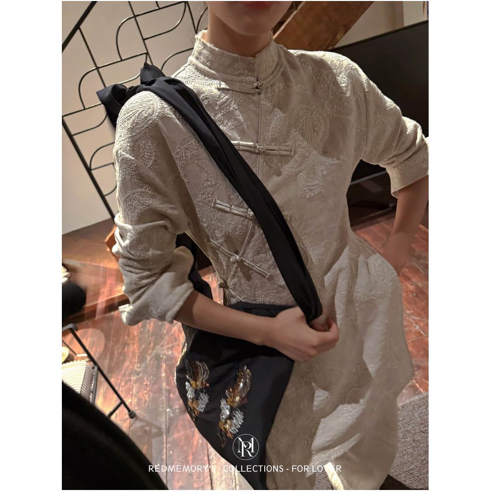 New Western style store REDMemoRY forever imbued with Eastern charm featuring a myriad of three dimensional floating flower embroidered shirts adorned with phoenix motifs image 0