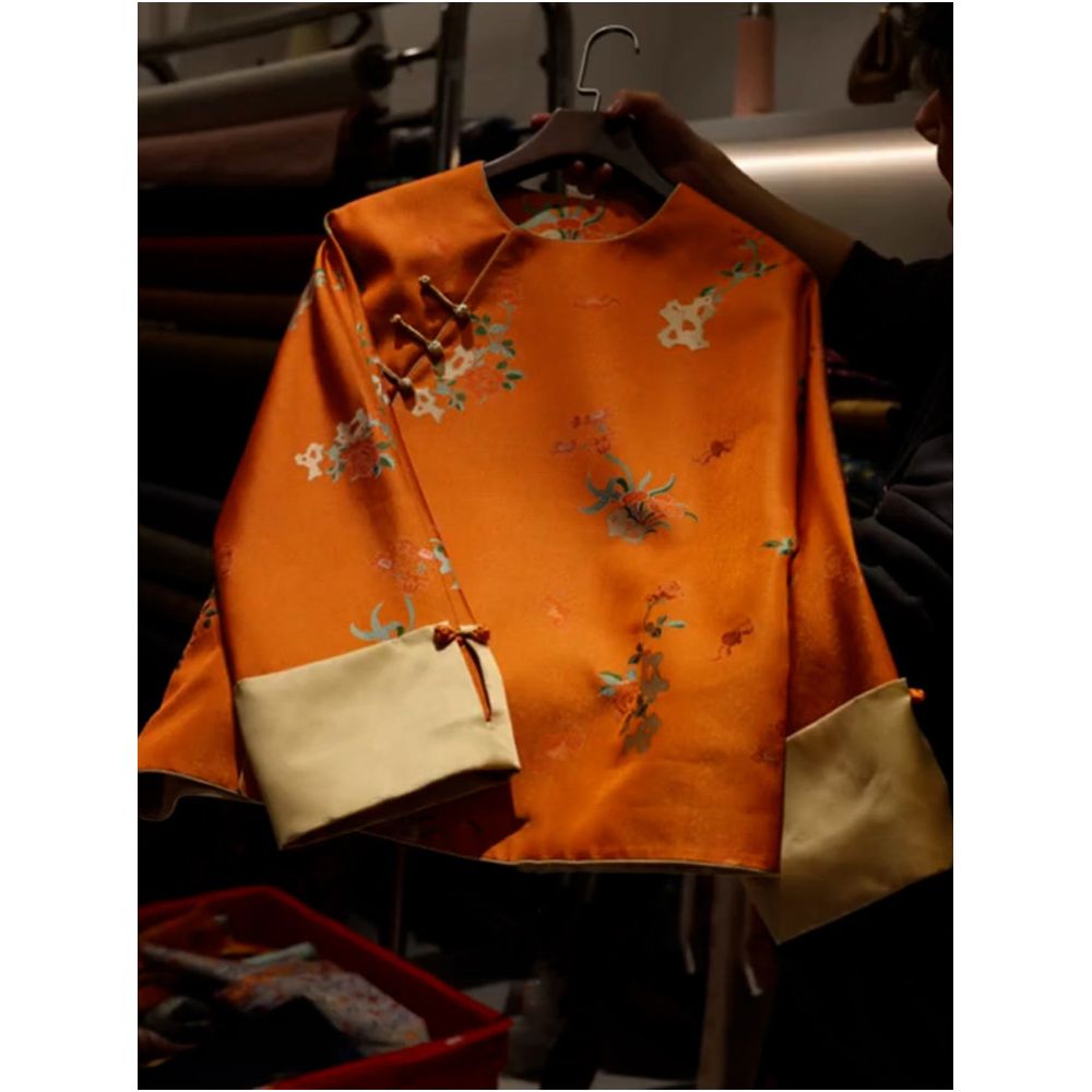 This year s popular trend is a beautiful and high end new Chinese style unique and super beautiful orange slant collar jacket for women in spring image 0